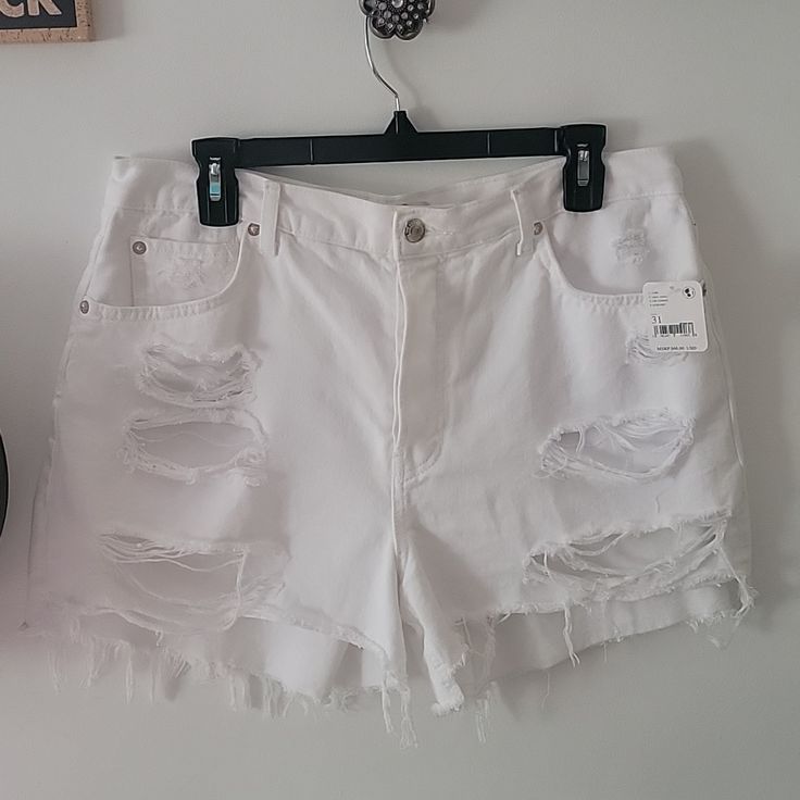 Free People We The Free Maggie Distressed White Denim Shorts Brand New With Tags Size 31 White Distressed High Waist Bottoms, White Distressed Mid-rise Bottoms, White Ripped Relaxed Fit Bottoms, White Ripped Denim Jean Shorts, White Ripped High Waist Shorts, White Distressed Denim Shorts, White Distressed Cutoff Bottoms, White High Waist Ripped Jean Shorts, White Ripped High Waist Jean Shorts