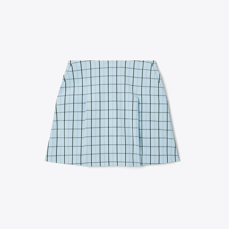 Feminine meets functional: Our Yarn-Dyed Pleated Golf Skort combines the spirit of the Seventies with technical ingenuity. Made with stretch twill for comfort and full range of motion, the A-line silhouette features a pleated front and built-in inner short. Refined and versatile, wear it on and off the course. Spring Pleated Skirt Bottoms With 4-way Stretch, Spring Tennis Skirt With 4-way Stretch, Spring Pleated Tennis Skirt With 4-way Stretch, Spring Pleated 4-way Stretch Tennis Skirt, Fitted Golf Shorts For Spring, Preppy Summer Workwear Skort, Preppy Fitted Short Skort, Casual Fitted Golf Shorts, Fitted Golf Skort For Summer