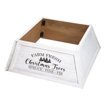 a white wooden box with the words farm fresh christmas trees spice and pine on it