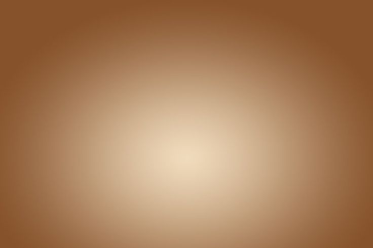 an image of a brown background that looks like it is blurry and has some light on