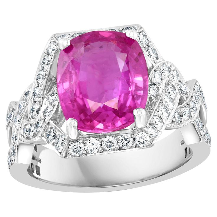 A classic, Ring Exact weight of 4.76 Ct natural Pink sapphire and 1.2 ct Round Diamond 18 Karat White gold Ring All round brilliant cut diamonds, Total diamonds 1.2 ct Natural Pink Sapphire in cushion shape , Pretty color, luster is amazing and have very little inclusions . Genuine Pink Sapphire specially of this large size are very rare and expensive . 18 Karat White Gold: 8.8 Grams Stamped for 750 Gold Ring Size 6 ( can be altered for free of charge) Single Cushion shape natural Pink Sapphire. Stunning Aesthetic, Pink Cushion, Ruby Rings, Pink Cushions, Golden Ring, Expensive Jewelry, White Gold Ring, Classic Ring, Ruby Ring