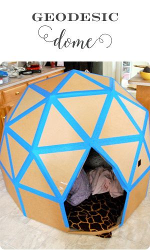 the inside of a cardboard dome that is made to look like a giraffe