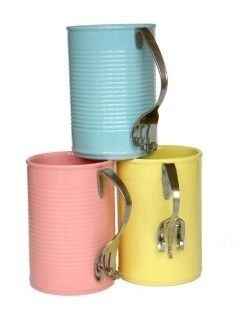 three different colored cups with handles on each one