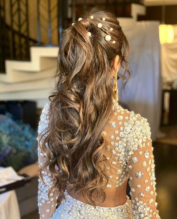 20+ Pearl-Adorned Bridal Hairstyles That You'll Love Wedding Hairstyles With Hair Accessories, Hairstyles For Long Hair On Gown, Sangeet Hairstyles For Bride On Gown, Braided Ponytail Hairstyles For Wedding, Hair Styles For Sangeet, Hairstyle With Gowns, Pony Tailed Hairstyle Wedding Indian, Saree Braid Hairstyles, Sangeet Hair Styles