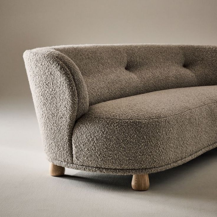 Generously cushioned to hug you as you sit, the Leonne long settee by goop features soft curves of custom wool-blend boucle for a grand statement on a small scale. The sweeping curved back, tufted buttons and teardrop-shaped American white oak legs certified sustainable by the Forest Stewardship Council r FSC come together for a piece that is elevated and timeless. Designed for small spaces, the sophisticated settee is also perfect for creating intimate seating in larger rooms. CB2 exclusive.  - Natural Linen Sofa, Precedent Study, Boucle Cushion, Ceramic Dinnerware Set, Leather Sectional Sofa, Linen Sofa, Old Fashioned Glass, River House, Leather Sectional