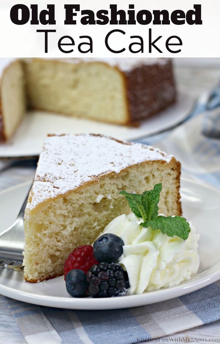 an old fashioned tea cake on a plate with berries