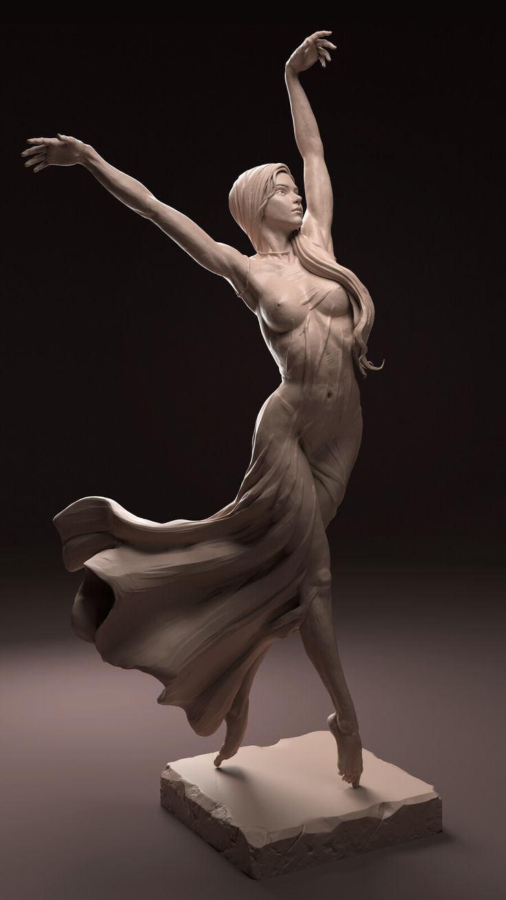 a statue of a woman with her arms outstretched