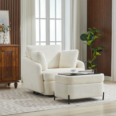 a white chair and ottoman in a living room