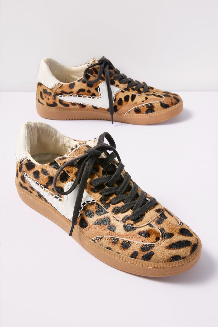 Make a stylish statement with these leopard pattern sneakers by Dolce Vita. Finished in genuine calf hair, the Notice Sneaker features a low-top silhouette, gum sole, and whipstitch detailing. | DOLCE VITA Women's Notice Sneakers, Size 8, Brown Wedge Tennis Shoes, Leopard Pumps, Leopard Sneakers, Shoe Wishlist, 2024 Trends, Swag Shoes, Pinterest Closet, Dolce Vita Shoes, Comfortable Flats