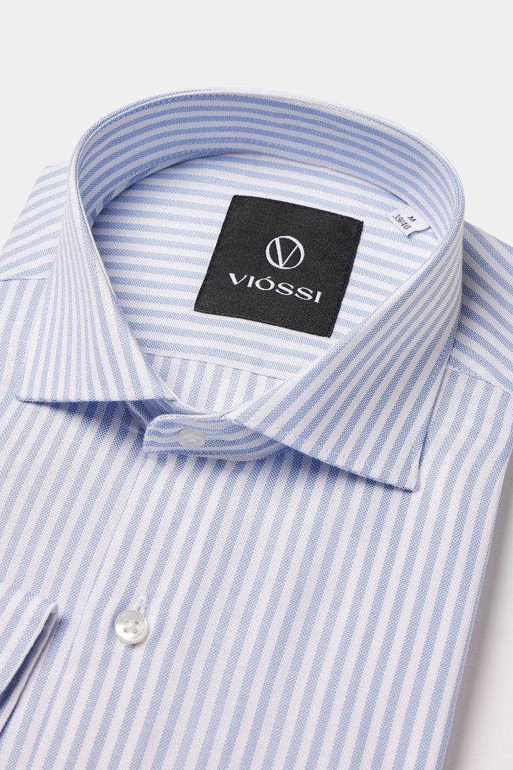 Color: sky-blue striped Spread collar Material: 100% cotton Fitting: slim-fit Care instructions: dry clean only Blue Cotton Shirt With Horizontal Stripes, Blue Vertical Stripes Formal Tops, Blue Vertical Stripes Top For Formal Occasions, Blue Vertical Striped Tops For Formal Occasion, Classic Blue Horizontal Stripe Tops, Classic Blue Horizontal Stripe Top, Light Blue Cotton Business Top, Striped Cotton Tops For Business, Striped Slim Fit Cotton Dress Shirt