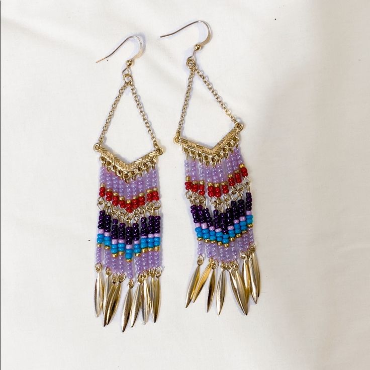 Brand New Perfect Condition No Defects Boho Bohemian Chic Tribal Purple Beaded Dangle Earrings 3” Hook Ear Wires For Pierced Ears Purple Ombre With Gold Accent Pieces At Bottom And Fashion Jewelry Please See My Other Listings For Other Colors. I Have Red, Green, Black , Blue And Beige As Well. Purple Jewelry With Gold Beads For Party, Purple Beaded Earrings With Round Beads For Festival, Purple Beaded Chandelier Earrings For Party, Purple Dangling Beads Jewelry For Party, Purple Beaded Chain Jewelry For Festival, Purple Jewelry With Colorful Beads For Festival, Adjustable Purple Beaded Earrings With Colorful Beads, Purple Dangling Beads Earrings For Party, Purple Gold Beaded Party Jewelry