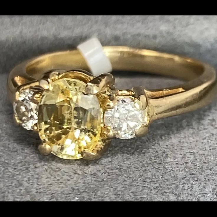 This Ring Is Preowned And Is Size 6.5 Hallmarked Yellow Diamond Ring, Classic Yellow Sapphire Diamond Ring, Classic Yellow Sapphire Oval Rings, Classic Yellow Gold Gia Certified Sapphire Ring, Classic Yellow Sapphire Ring With Prong Setting, Classic Gia Certified Yellow Gold Sapphire Ring, Classic Yellow Ring With Center Stone, Classic Yellow Sapphire Diamond Ring For Anniversary, Classic Yellow Rings With Center Stone