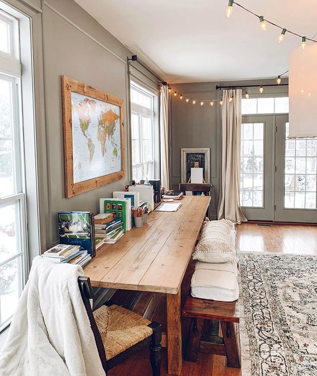 an instagramted photo of a dining room and living room