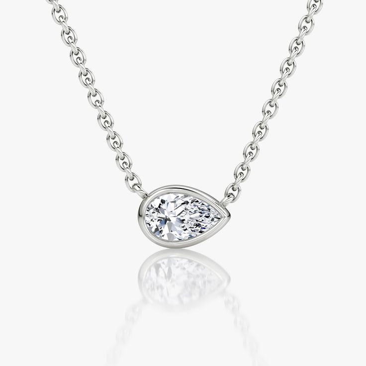 The Bezel Solitaire Necklace combines vintage-inspired detail and modern appeal together for a look that’s timelessly elegant. Classic Teardrop Pendant Necklace, Timeless Teardrop Bezel Set Jewelry, Classic Formal Solitaire Necklace With Teardrop Pendant, Classic Diamond Necklace With Bezel Setting, Classic Teardrop Single Cut Diamond Necklace, Timeless Teardrop Solitaire Necklace In White Gold, Elegant Drop Jewelry With Bezel Setting, Timeless White Gold Teardrop Solitaire Necklace, Classic Teardrop Necklace With Single Diamond