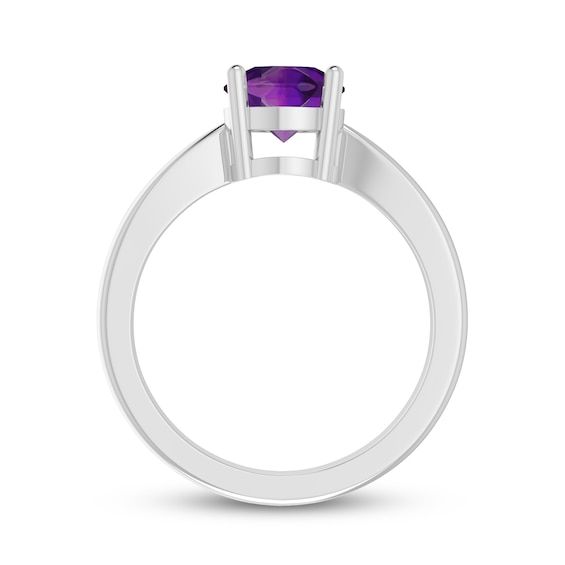 Elegant and always classic, this gorgeous solitaire ring shines with a beautiful round-cut amethyst. The ring is set in sterling silver. Modern Birthstone Ring With Round Cut Center Stone, Modern Round Cut Birthstone Ring With Center Stone, Amethyst Birthstone Ring With Round Cut, Classic Birthstone Ring With Round Cut Gemstone, Elegant Amethyst Birthstone Ring In Round Band, Classic Birthstone Ring With Round Band, Classic Round Band Birthstone Ring, Modern Solitaire Birthstone Ring With Round Band, Modern Solitaire Birthstone Ring