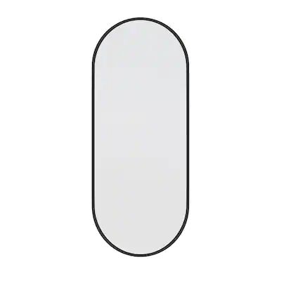 an oval mirror on a white background with black trimmings and a single line in the middle