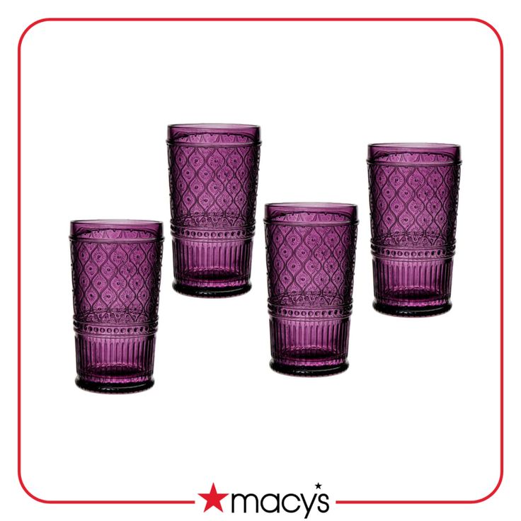 four purple glass tumblers sitting next to each other