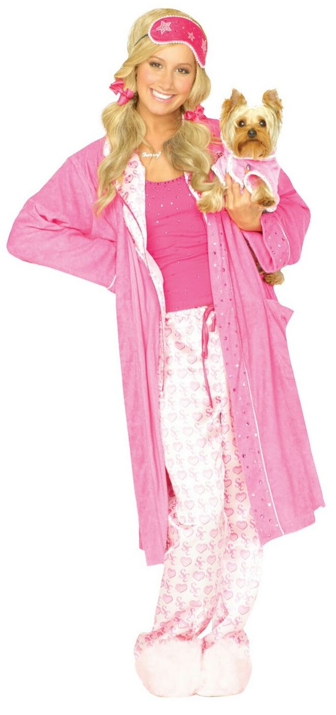 a woman in pajamas holding a small dog wearing a pink hat and robe on top of her head