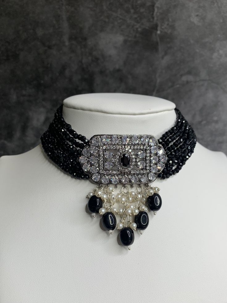 American diamond choker set. Victorian black polish with crystal beads. Pendent is about one hand half inch wide. Matching earring is about 2 inch long. Black Polish Jewellery, Elegant Black Beads Jewelry For Evening, Elegant Black Beaded Jewelry For Evening, Elegant Black Beaded Evening Jewelry, Elegant Black Choker Jewelry, Jeweled Pendant Jewelry For Evening, Silver Beaded Choker For Evening, Formal Black Bead Choker Jewelry, Formal Beaded Dangle Jewelry