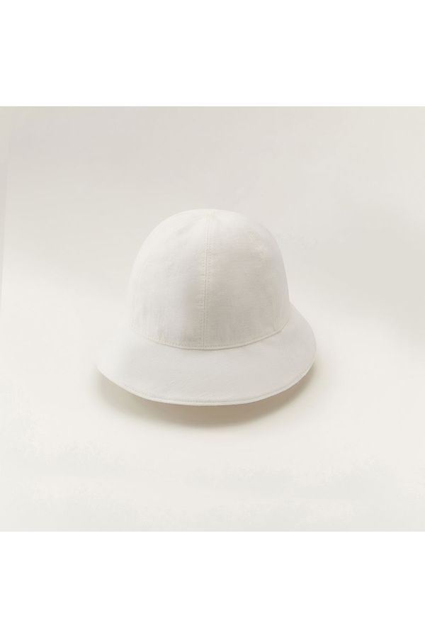 The Helen Kaminski Flora Cloche features expert craftsmanship and simple design. This sustainable and stylish cloche boasts a 6 panel construction and a 6cm brim, with embroidered eyelet detailing on the crown. The lightweight cotton fitted lining is adjustable for a perfect fit, and the hat is made from 100% linen, rated for UPF50+ sun protection. Crafted from 100% linen 6 panel cloche 6cm brim Embroidered eyelet detail on crown Size adjustable lining channel for fit Lightweight cotton fitted l Classic Spring Cloche Hat, Casual Spring Hat With Structured Crown, White Classic Cloche Hat For Summer, Classic White Cloche Hat For Summer, Classic White Cloche Hat With Wide Brim, Classic White Bucket Hat With Short Brim, Classic White Wide Brim Cloche Hat, Classic Cloche Sun Hat For Spring, Brimmed White Bucket Hat