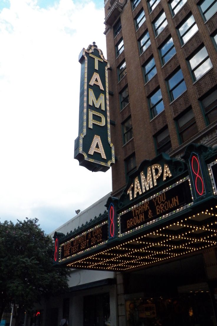 the marquee for tampa theater is lit up