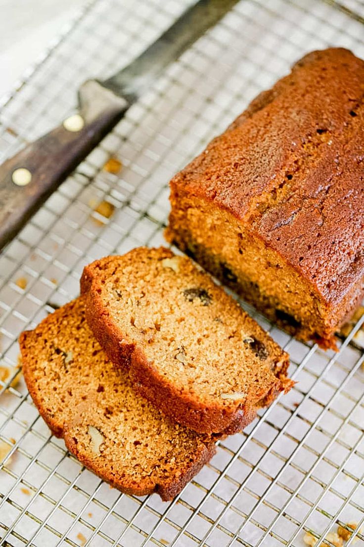 two slices of banana bread on a cooling rack