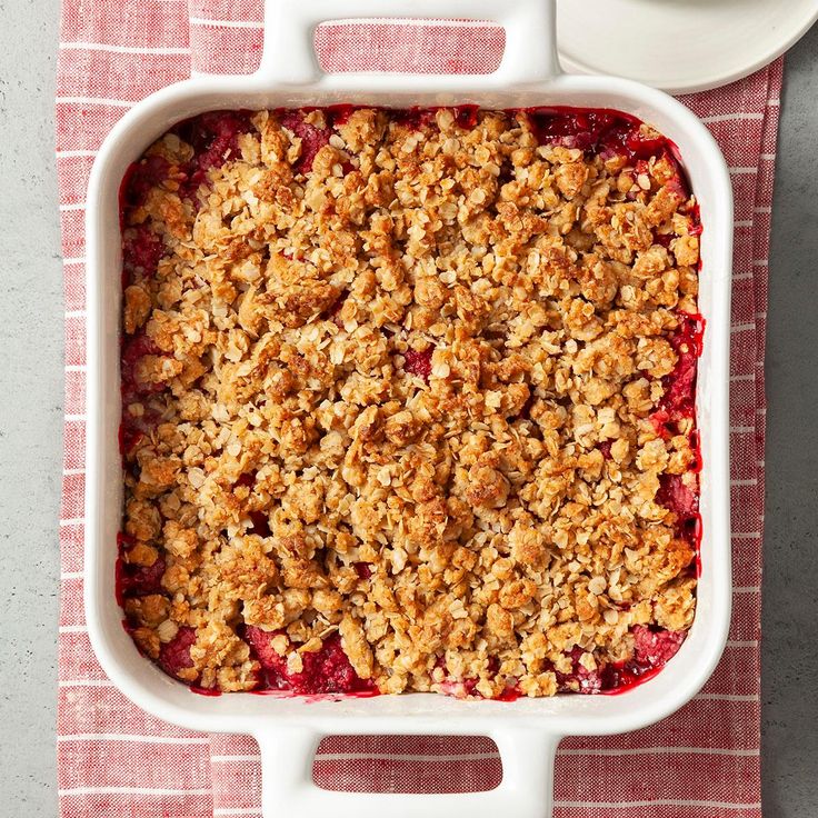 a casserole dish with crumbled topping on top