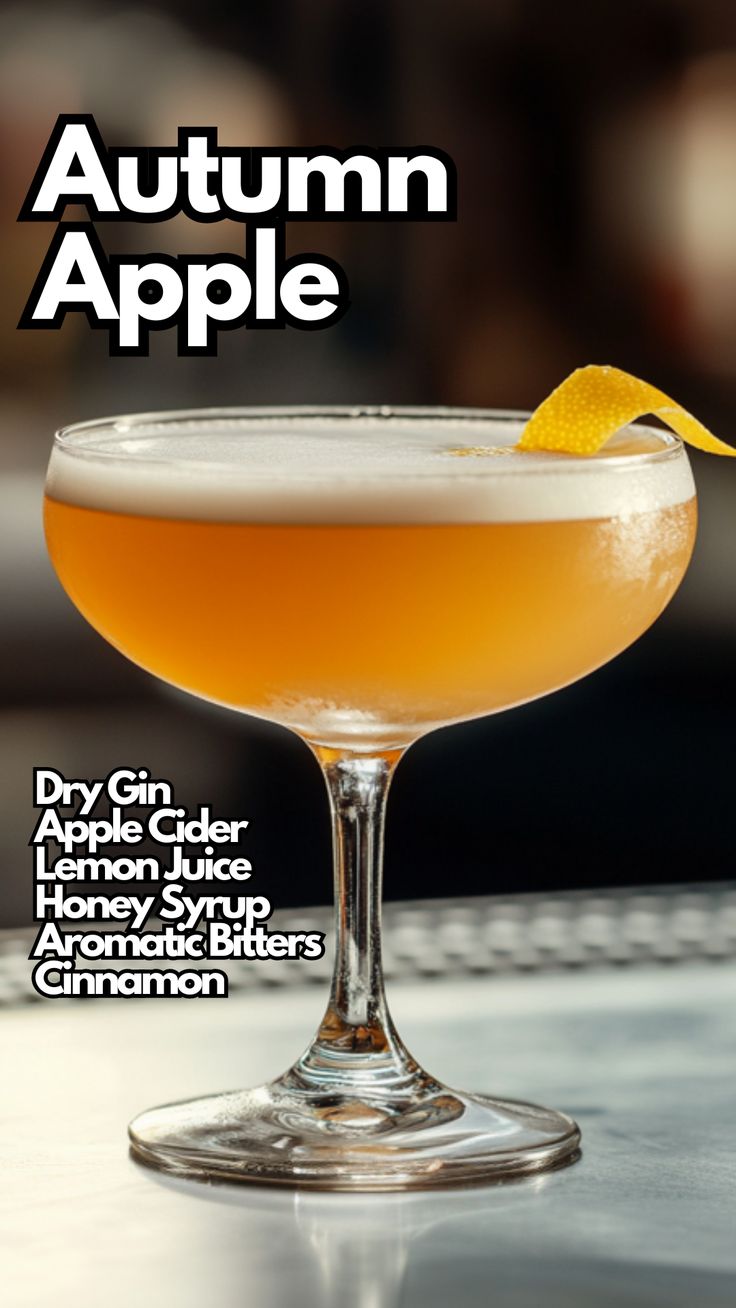 an orange drink sitting on top of a table