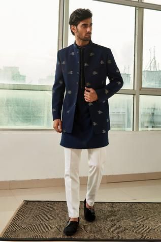 Navy blue bandhgala with all over embroidery. Comes with inner kurta and pant.
Components:3
Embroidery
Neckline:Mandarin collar
Sleeve Length:Full
Fabric:Viscose Polyester
Color:Blue
Embroidered kurta placket
Welt pocket
Side slits
Button front closure - Aza Fashions Men’s Koti Kurta, Men’s Bandhgala, Indowestern Kurta For Men, Tilak Dress For Men, Bandgala Suit For Men, Kurta For Wedding For Men, Bandgala Suits For Men, Indian Suits For Men, Party Wear Kurta Pajama For Mens