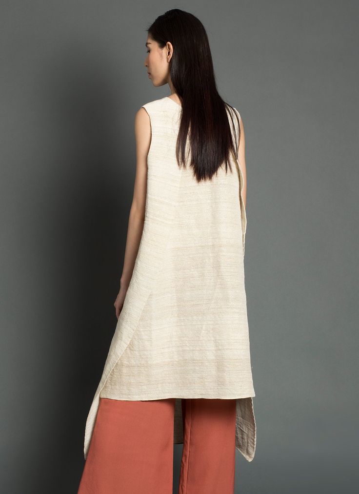 KAAREM - Tortoise Sleeveless Layered Dress - Natural Beige Asymmetrical Sleeveless Dress, Sleeveless Beige Maxi Dress With Side Slits, Sleeveless Asymmetrical Dress With Side Slits, Beige Sleeveless Asymmetrical Dress, Sleeveless Beige Asymmetrical Summer Dress, Spring Sleeveless Asymmetrical Dress With Side Slits, Sleeveless Maxi Dress With Side Slits For Daywear, Sleeveless Dress With Pleated Back For Daywear, Sleeveless Dresses With Side Slits For Daywear