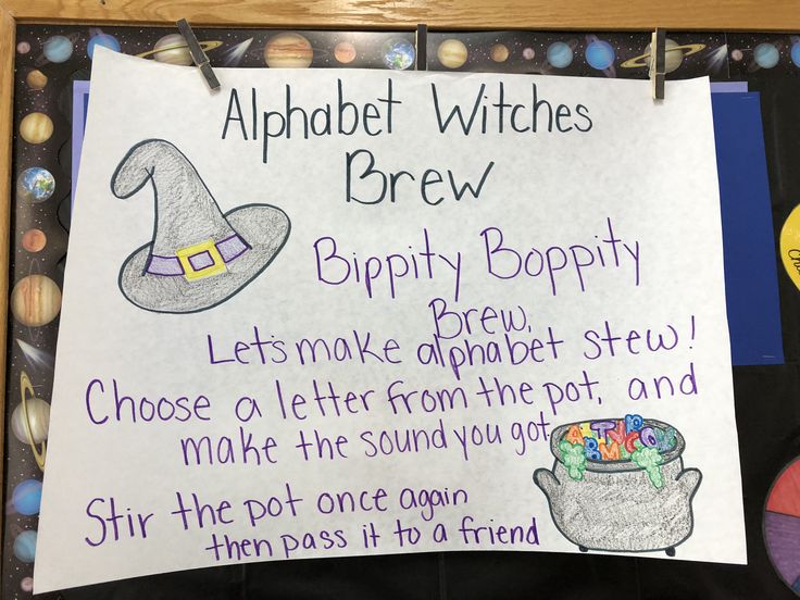 a sign posted on a bulletin board that says alphabet witches brew, bippty borpity and let's make an applivet stew