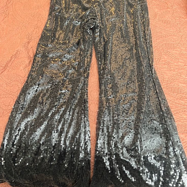 Reposhing This Item I Purchased From @Jennamariebo. Loved It, But Ready To Rotate For Something New. Never Worn And Tags Still Attached! Purchased Them For The Renaissance Concert But Going With Another Option! Questions? Leave A Comment Below! Black Glitter Party Bottoms, Festive Black Sequin Bottoms, Black Glitter Bottoms For Evening, Glamorous Black Holiday Bottoms, Metallic Disco Bottoms For Party, Silver Fitted Pants For Party Season, Metallic Sparkling Bottoms For Party, Glamorous Black Glitter Pants, Elegant Silver Party Pants