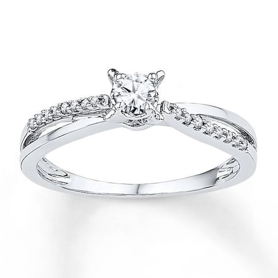 a white gold engagement ring with diamonds