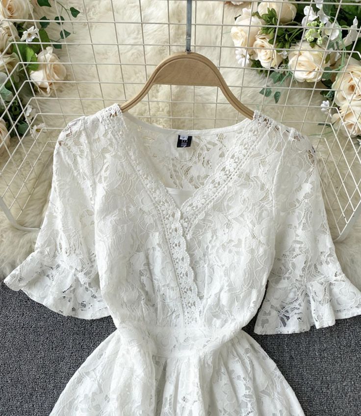 White A line lace v neck dress Fabric: lace Color: white Size: S, M, L, XL S length 125 bust 88 waist 68 sleeve length 32 M length 126 bust 92 waist 72 sleeve length 33 L length 127 bust 96 waist 76 sleeve length 34 XL length 128 bust 100 waist 80 sleeve length 35 2XL length 129 bust 104 waist 84 sleeve length 36 Scalloped Lace V-neck Dress For Brunch, Delicate Lace V-neck Dress For Brunch, Feminine V-neck Delicate Lace Top, Chic V-neck Dress With Delicate Lace, White V-neck Lace Dress With Lace Trim, V-neck Lace Top For Brunch, Fitted V-neck Lace Dress, Feminine V-neck Delicate Lace Dress, White Lace V-neck Dress