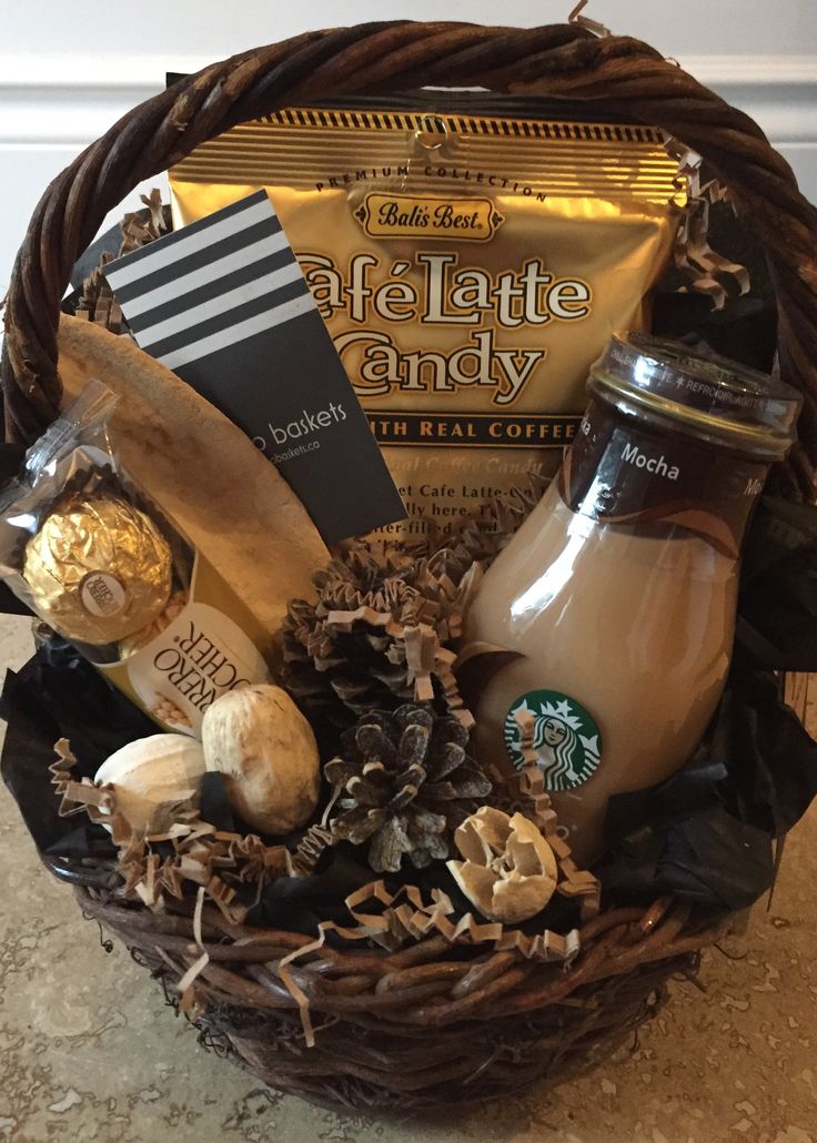 a basket filled with coffee, cookies and other items