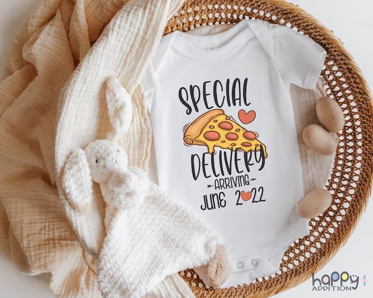 a baby's personalized onesuit with a slice of pizza on it