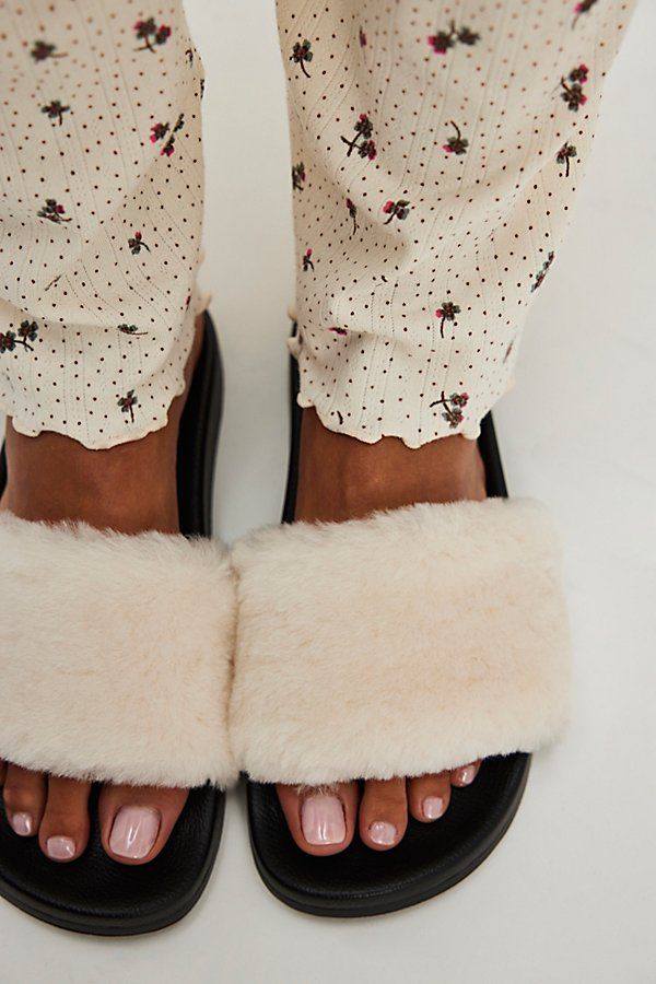 Cozy and comfortable, these slippers feature an easy slip-on design and soft sheepskin upper with a durable rubber sole and open-toe silhouette. **Features:** Slip-on style, open-toe style, sheepskin upper, durable rubber sole **Why We ❤ It:** These slides are perfect for keeping your feet comfy in and out of the house. | Cloud Nine Bella Slippers at Free People in White, Size: L Cloud Slippers, Cloud Nine, Jacket Outfits, Boho Outfits, Open Toe, Shoes Flats, Rubber Sole, Free People, The House