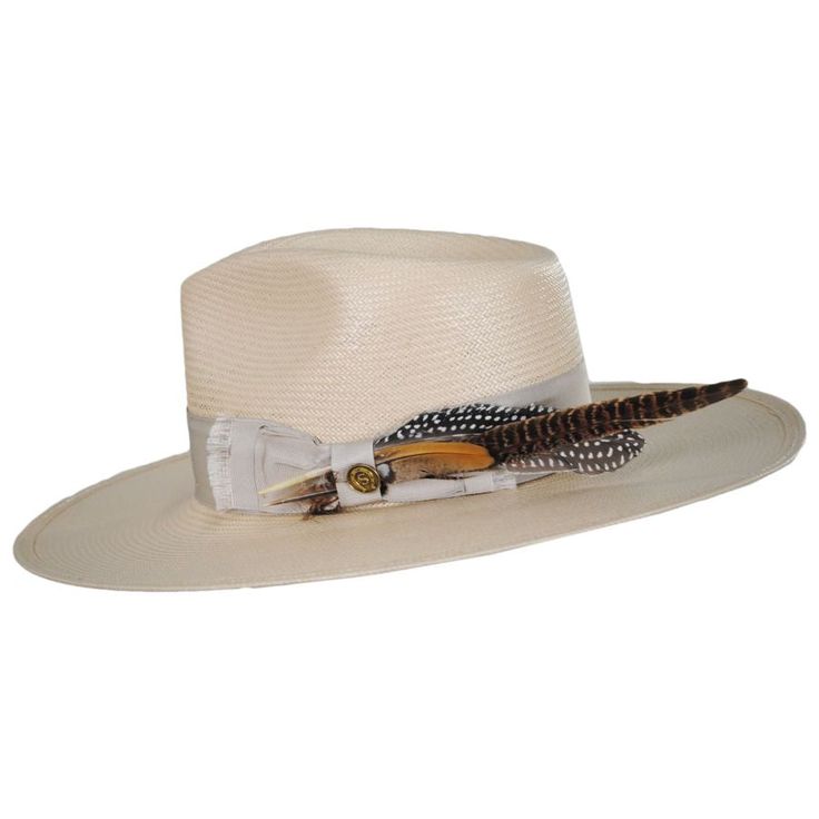 The stylish wide brim Atacama brings a modern appeal to a classic style. The oversized feathers on the hat are just one of its unique features. 4" Flat Brim and 5" Teardrop Crown All Natural Shantung Straw Firm Finish Made in the USA Feathered Hat Bands For Beach Events In Summer, Feathered Hat Bands For Beach With Curved Brim, Beach Hats With Feathers For Spring, Feathered Brimmed Hat Bands For Summer, Feathered Hat Bands With Curved Brim For The Beach, Brimmed Hat Bands With Feathers For Summer, Elegant White Panama Hat For Rodeo, Beach Hats With Feathers And Wide Brim, Wide Brim Beach Hat With Feathers