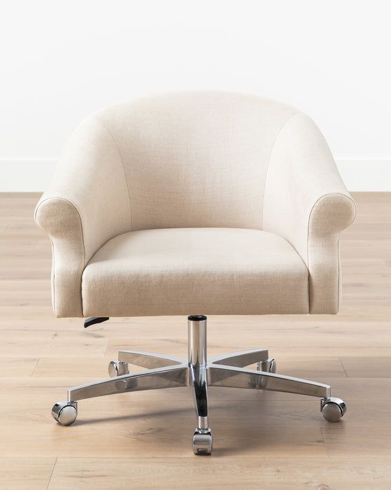 an office chair sitting on top of a hard wood floor