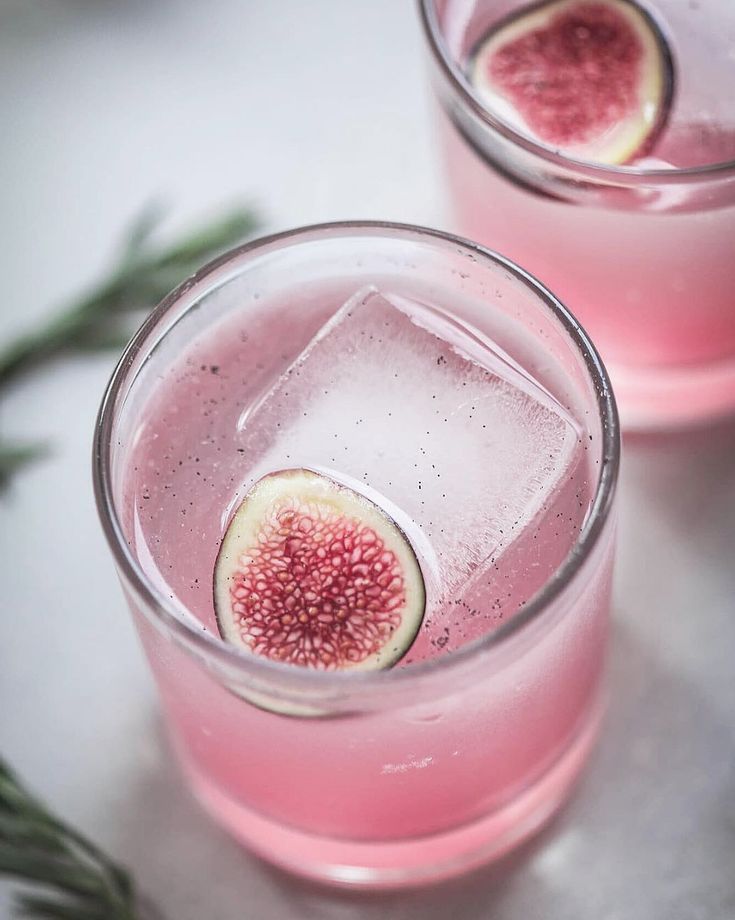 two glasses filled with watermelon and ice