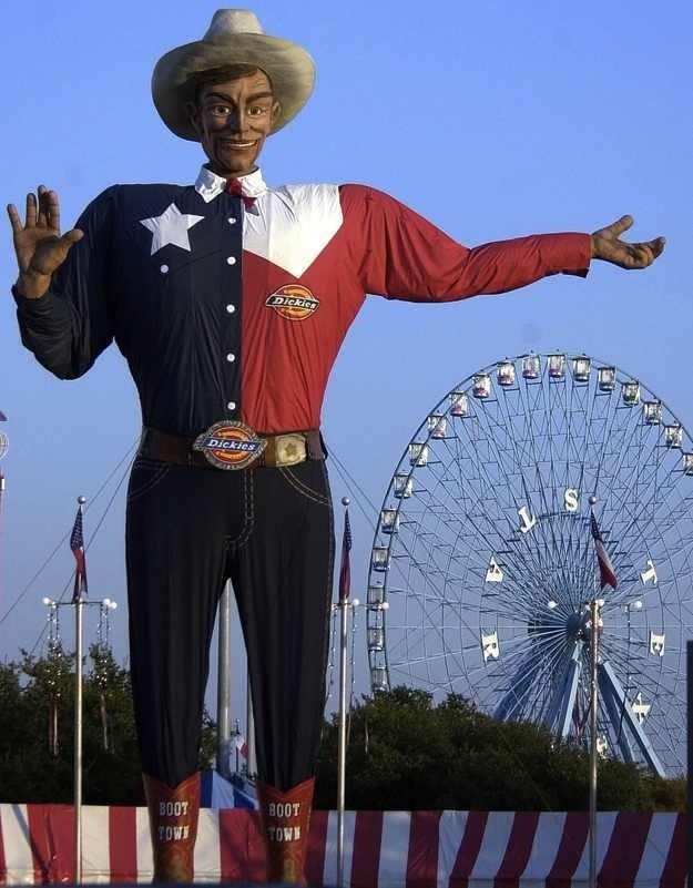 a man in a cowboy outfit standing next to a ferris wheel with the text free state fair of texas