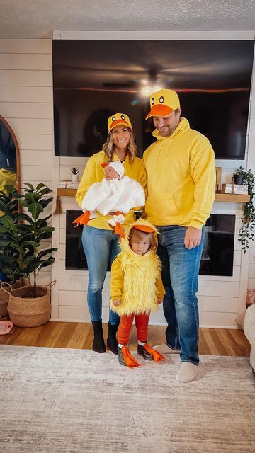 a man, woman and child dressed up in costumes