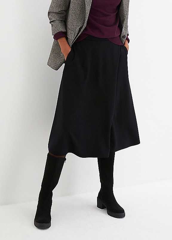 bonprix's Ponte Jersey Midi Skirt is the perfect piece for any fashionista looking to add a touch of chic to their wardrobe! This A-line skirt with an elasticated waist is plain but casual enough for everyday wear. You'll be sure to turn heads in this stylish midi skirt!Brand: bonprixMachine wash70% Viscose, 25% Polyester, 5% ElastaneLength approx. 72 cmPlease Note: European sizing tends to run smaller than UK. We suggest sizing up for the perfect fit! Stylish Midi Skirt, A Line Skirt, A Line Skirts, Midi Skirt, Everyday Wear, Womens Skirt, Perfect Fit, A Line, Turn Ons