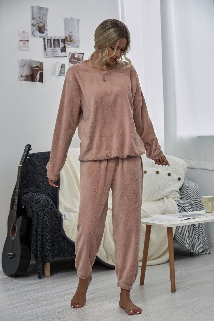 Keep your loungewear casual-cool with this sweatshirt and joggers set featuring a comfortable stretch-infused fit. Includes sweatshirt and matching joggers (two pieces total) Size Guide: Talita s 5’6” tall, and has a 33” bust, 24” waist, & 35” hips. She is wearing a S / US 4 / AU 8. This loungewear set is true to size. Sweatshirt (size S): 29" long from high point of shoulder to hem Joggers (size S): 27" inseam Material: 100% polyester Care Instructions: Machine wash / Cold hand wash Pink Crewneck Sweatshirt, Joggers Set, Blue Crewneck, Grey Crewneck, Pink Crewneck, Loungewear Set, Lounge Set, Lounge Sets, Size Pattern