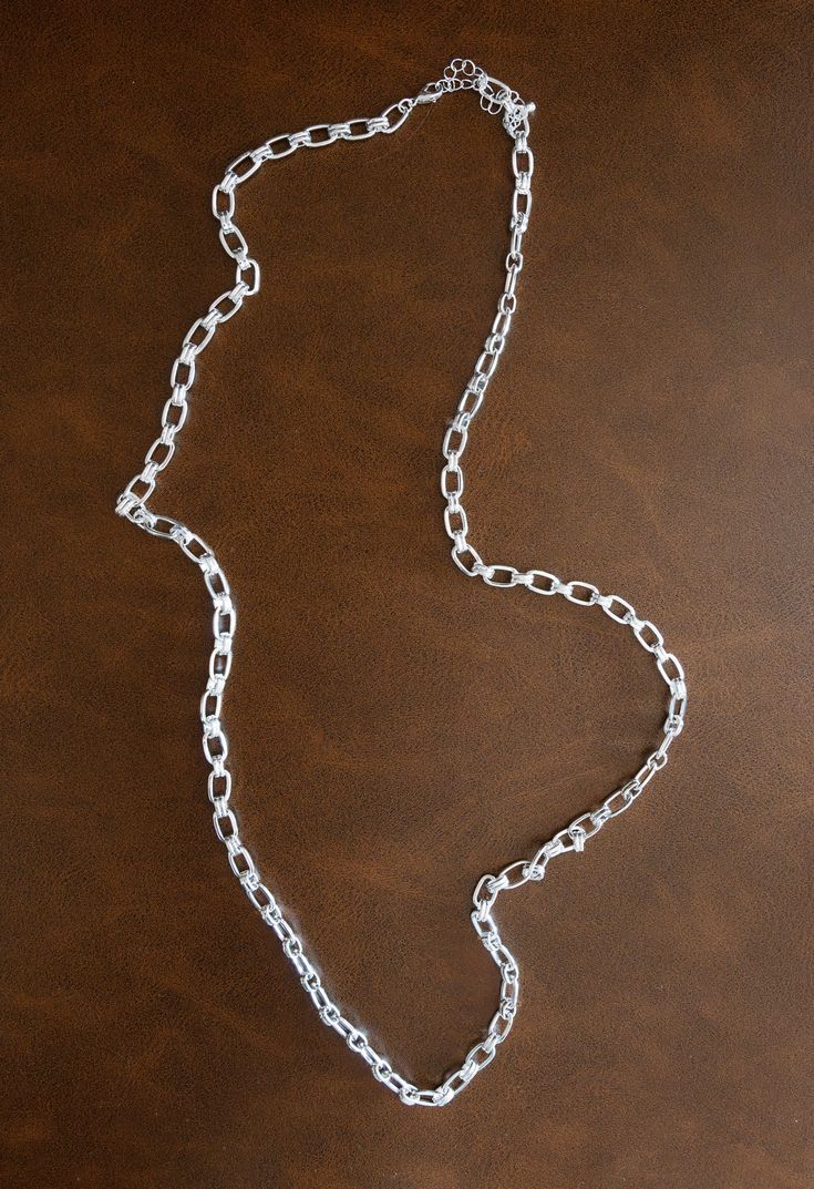 Style & Details:This long chain necklace is a versatile addition to any jewelry collection, perfect for layering or wearing on its own. ITEM#: N-2480S Shipping Free Shipping when you spend $100 or more! Orders below $100 will be charged $7 for standard shipping. Orders typically ship within 1-3 business days. We will gladly accept returns on items that are unworn, unwashed, free from fragrances, and tags still attached. Customers are responsible for return fees. Layered Necklaces Silver, Long Sleeve Outerwear, Long Midi Dress, Long Chain Necklace, Coffee Date, Shipping Orders, Long Chain, Long Sweaters, Sicily