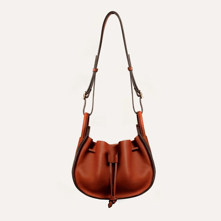 Bucket Bag DIANE - Rust Versatile Crossbody Bag With Dust Bag, Versatile Hobo Bag With Bucket Shape, Versatile Bucket-shaped Hobo Bag, Versatile Bucket Shape Hobo Bag, Everyday Bag With Detachable Strap In Bucket Shape, Large Capacity Leather Pouch, Hobo Bag With Removable Pouch For Errands, Large Capacity Leather Satchel Pouch, Brown Travel Bags In Bucket Shape