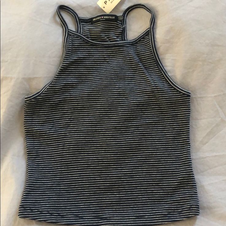 Navy/White Striped Tank Never Been Worn! Striped Racerback Tank Top For Summer, Striped Racerback Tops For Spring, Summer Striped Stretch Top, Summer Racerback Tops For Day Out, Fitted Racerback Summer Tops, Fitted Racerback Top For Vacation, Fitted Striped Summer Tank Top, Striped Fitted Summer Tank Top, Fitted Striped Tank Top For Summer