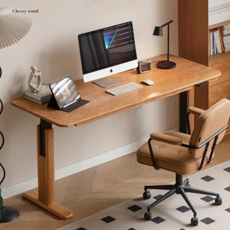 an office desk with a computer on it and a chair in front of the desk