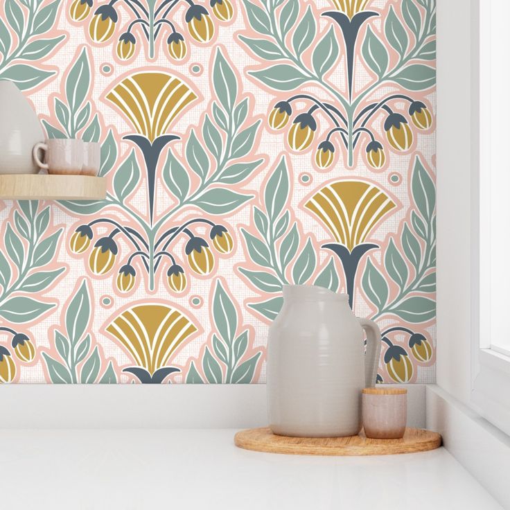 the wallpaper in this kitchen is designed with an art deco design, and features green leaves