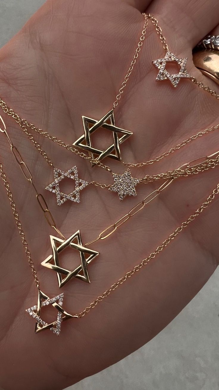 Wear this stunning 14k yellow gold Star of David necklace with pride, whether as a standalone piece or as a radiant addition to your necklace stack. Let it symbolize not just faith, but also the strength found in embracing your individual journey and heritage. 16mm height 16” long